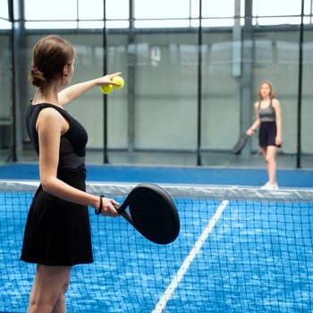 Web_Square-women-playing-paddle-tennis-side-view