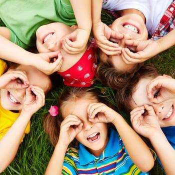 children-playing-grass web square