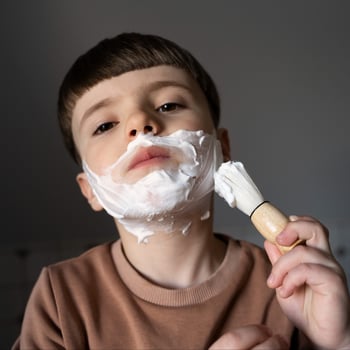 front-view-little-kid-using-shaving-cream