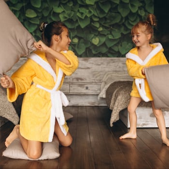 sisters-fighting-with-pillows sisters-fighting-with-pillows